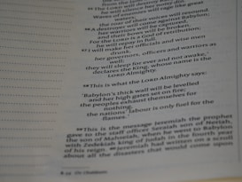 A close-up image of a page from a book, featuring religious or biblical text. The page contains specifically numbered sections and is printed in two columns. The text appears focused on religious prophecy and warnings.
