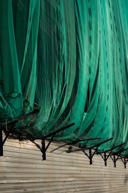 Bird net installation process in progress.