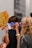 A group of friends having fun with VR headsets at a party.