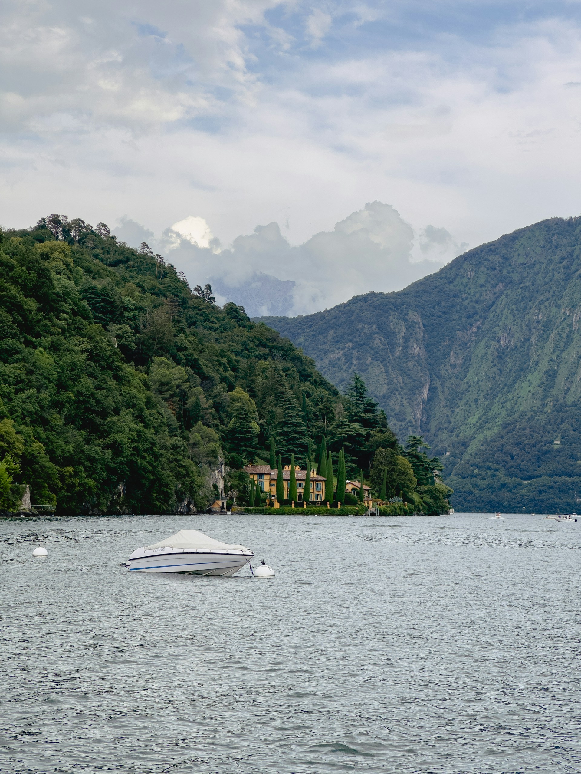 woman wearing yellow long-sleeved dress under white clouds and blue sky during daytime