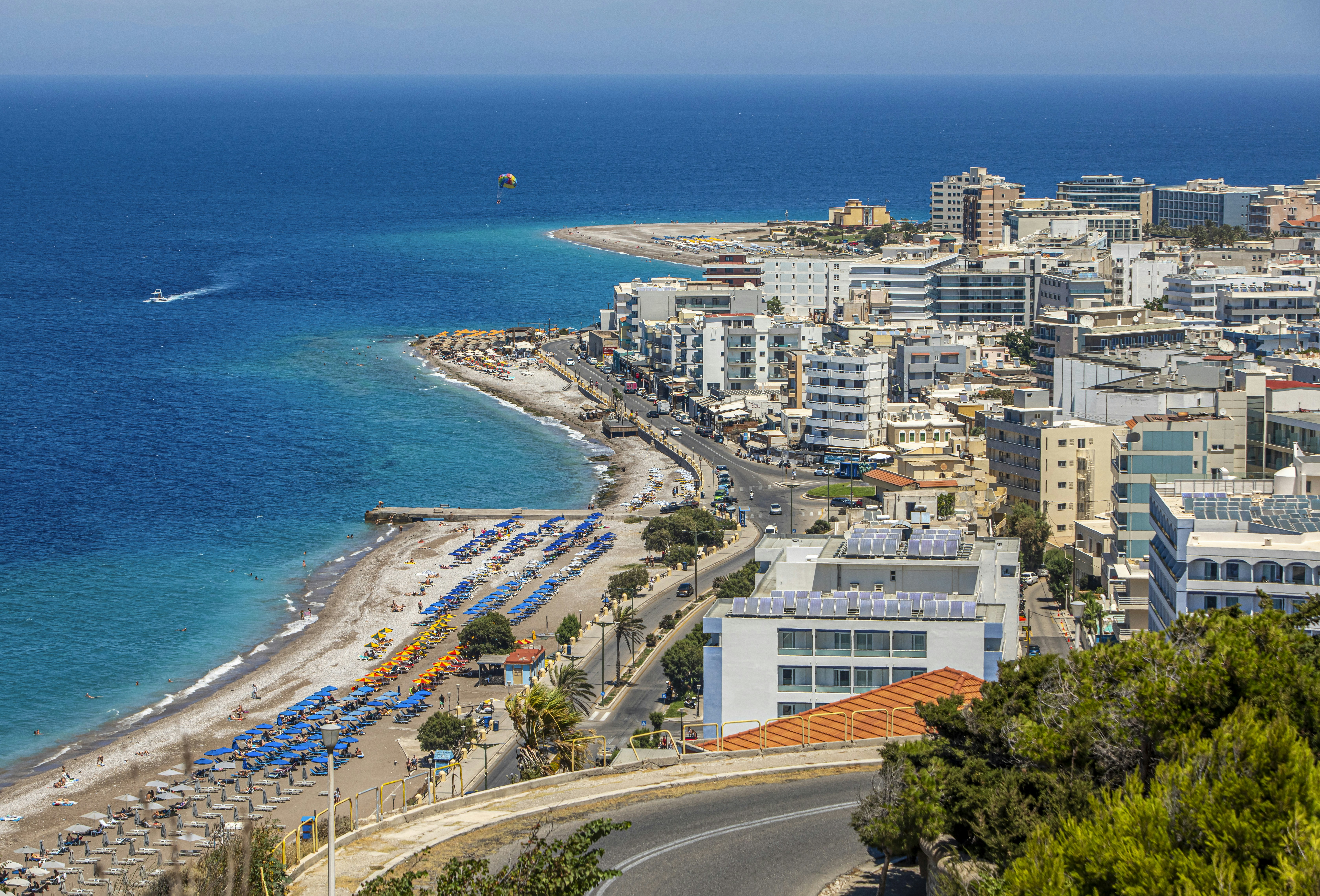 a view of a beach with a boat in the water