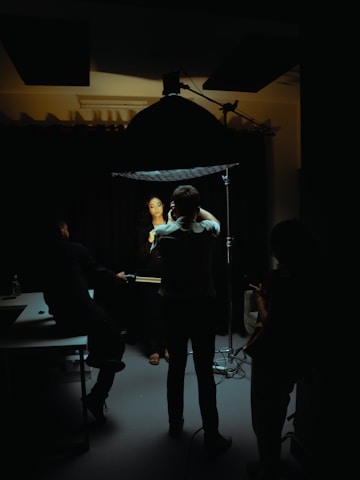 a group of people in a dark room