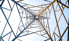 a tall metal structure with a sky in the background