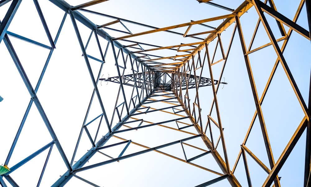 a tall metal structure with a sky in the background