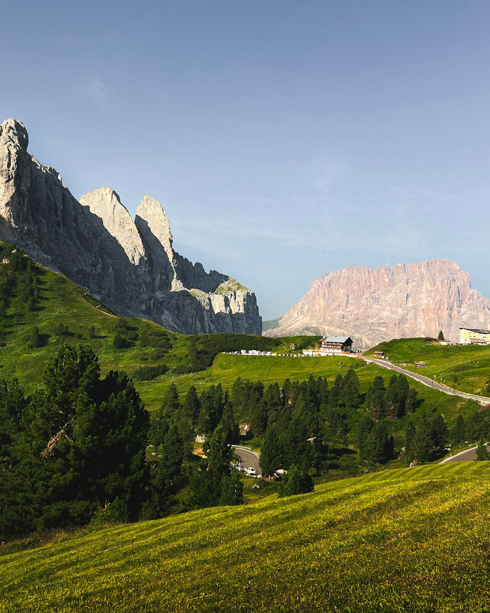 a mountain range with a road winding through it