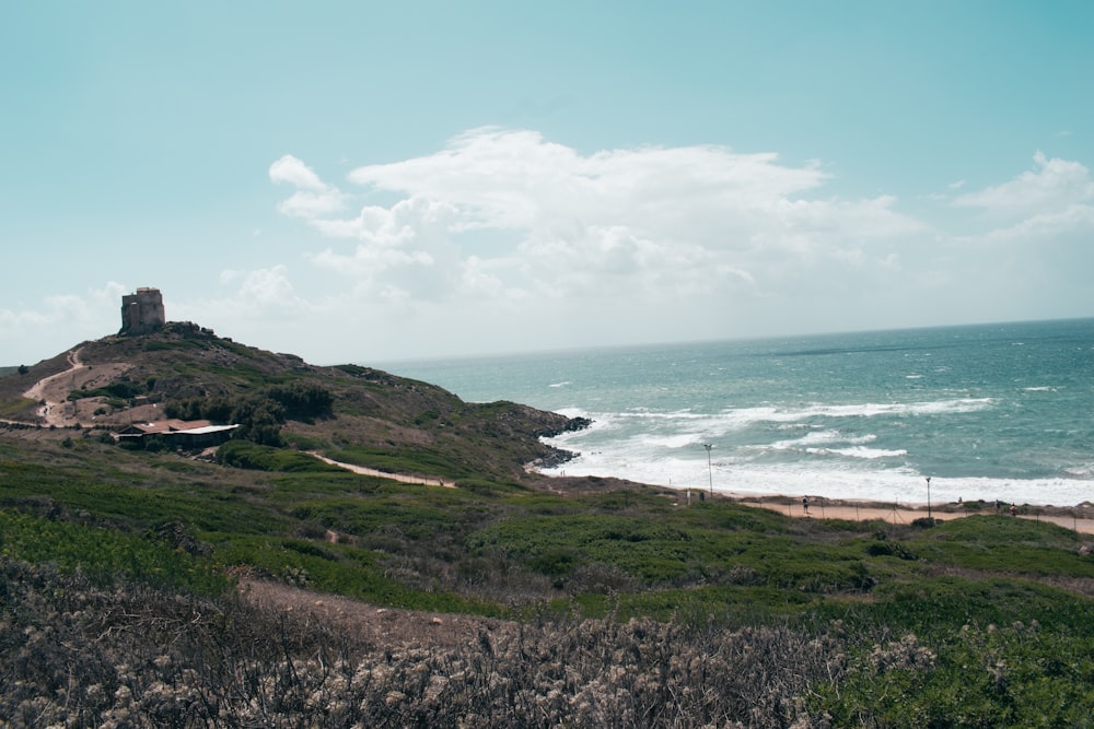 a view of the ocean from a hill