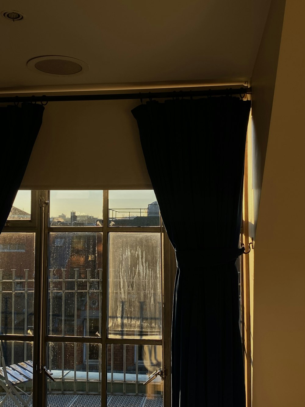 a window with a view of a city outside