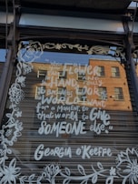 A client testimonial quote overlaid on a photo of their bustling storefront.