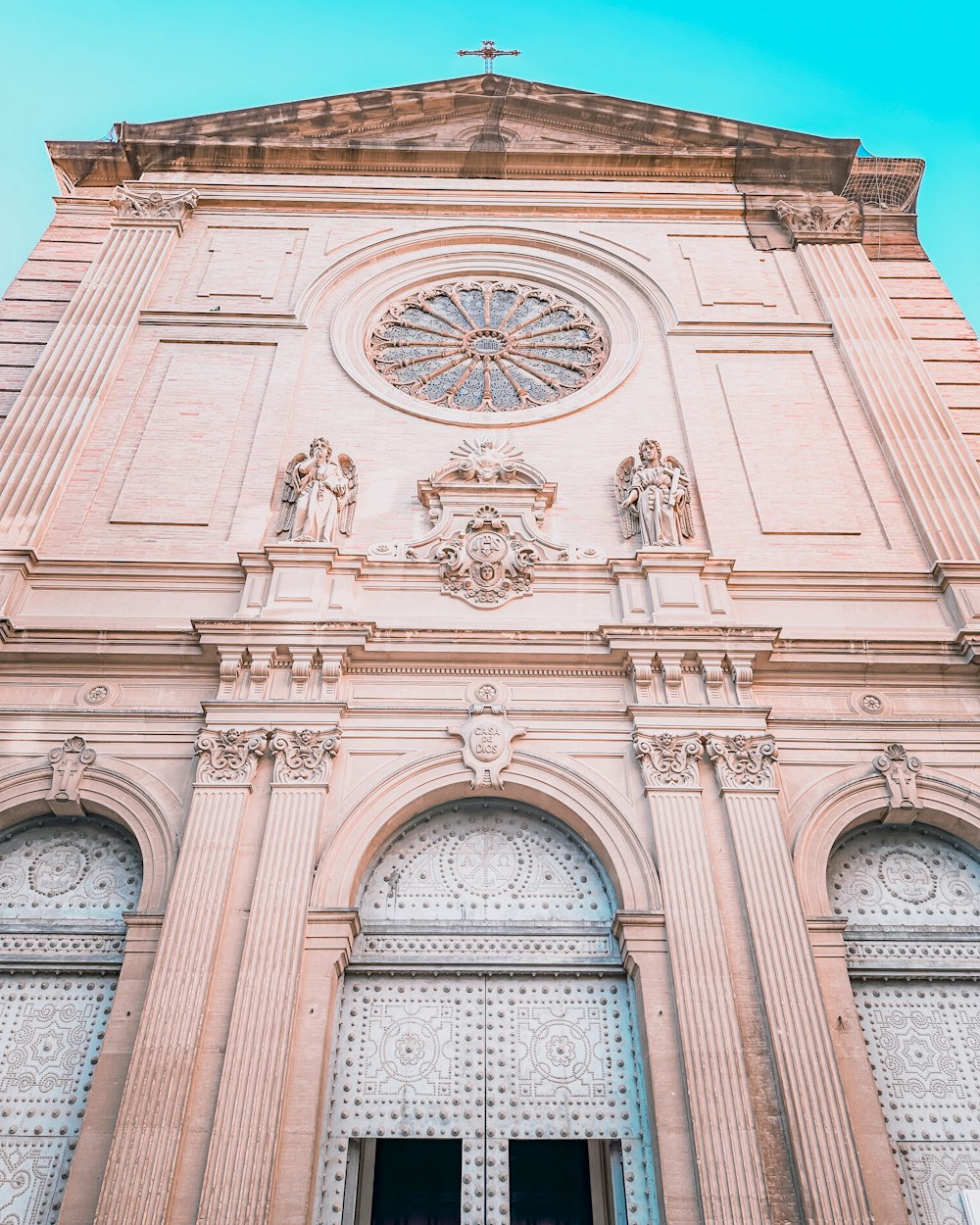 a tall building with a clock on it's side