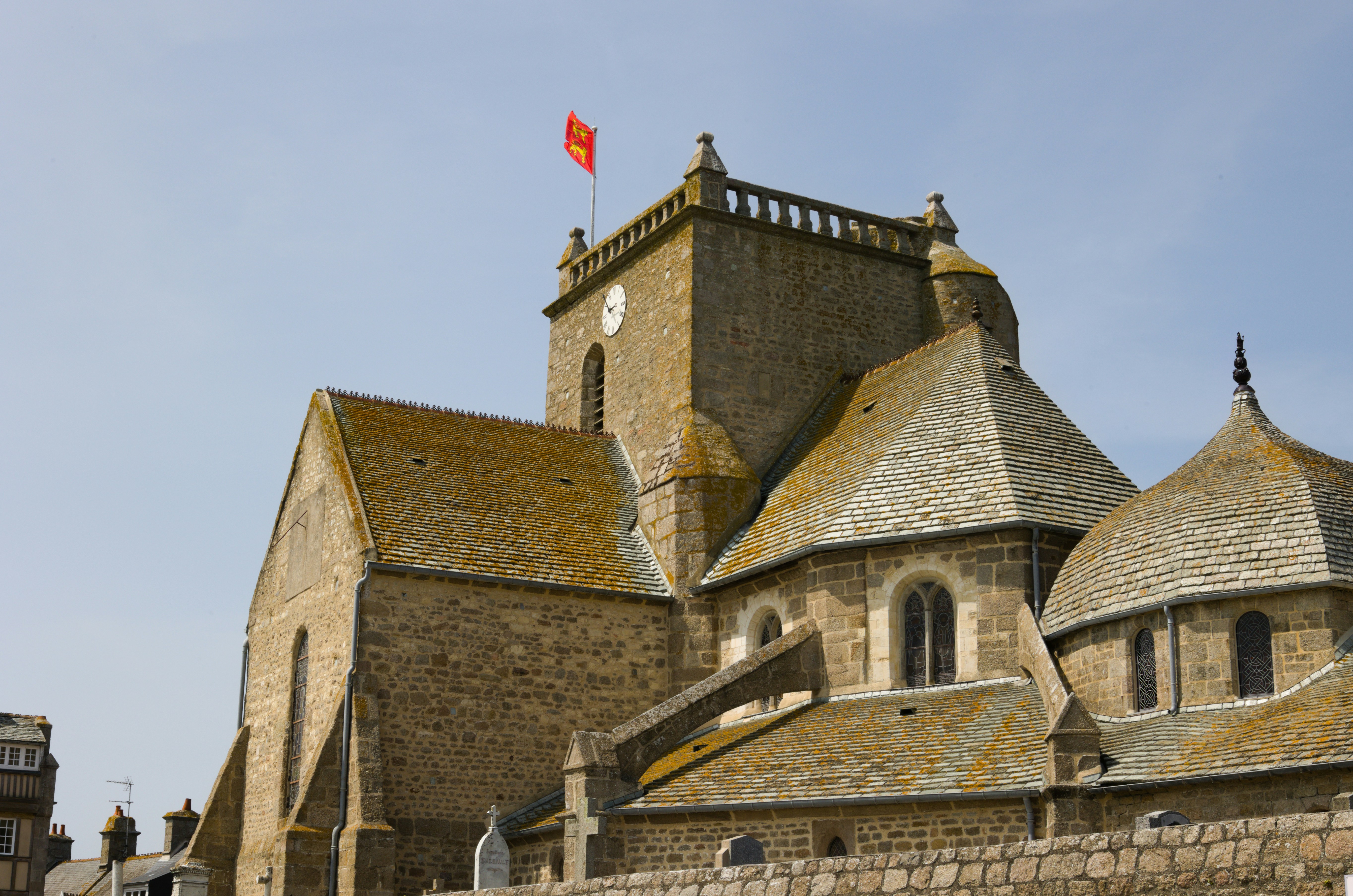 a castle like building with a flag on top of it
