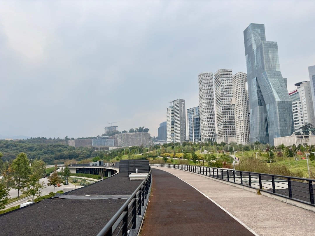 a view of a city from a bridge,