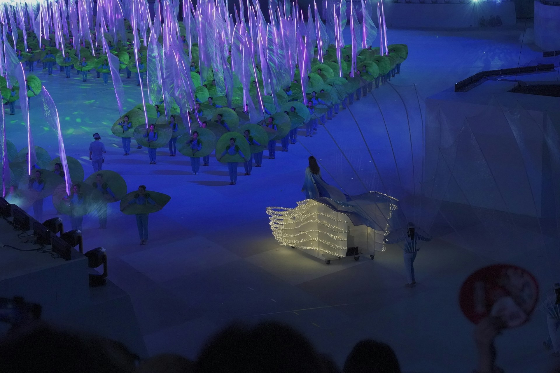 woman wearing yellow long-sleeved dress under white clouds and blue sky during daytime