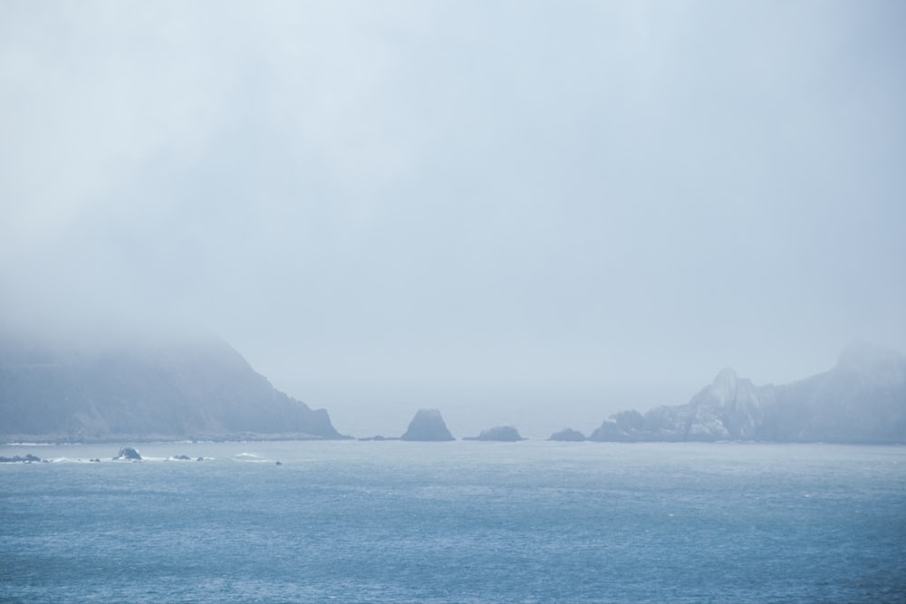 a large body of water surrounded by mountains