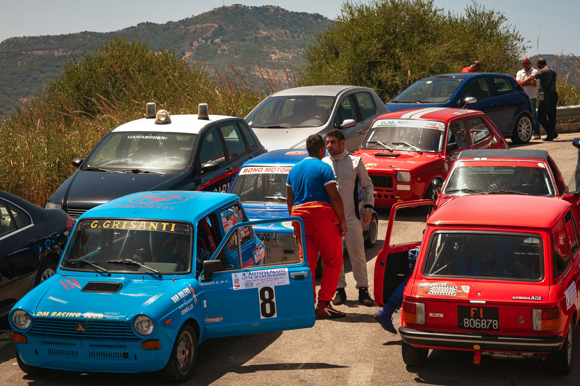 woman wearing yellow long-sleeved dress under white clouds and blue sky during daytime