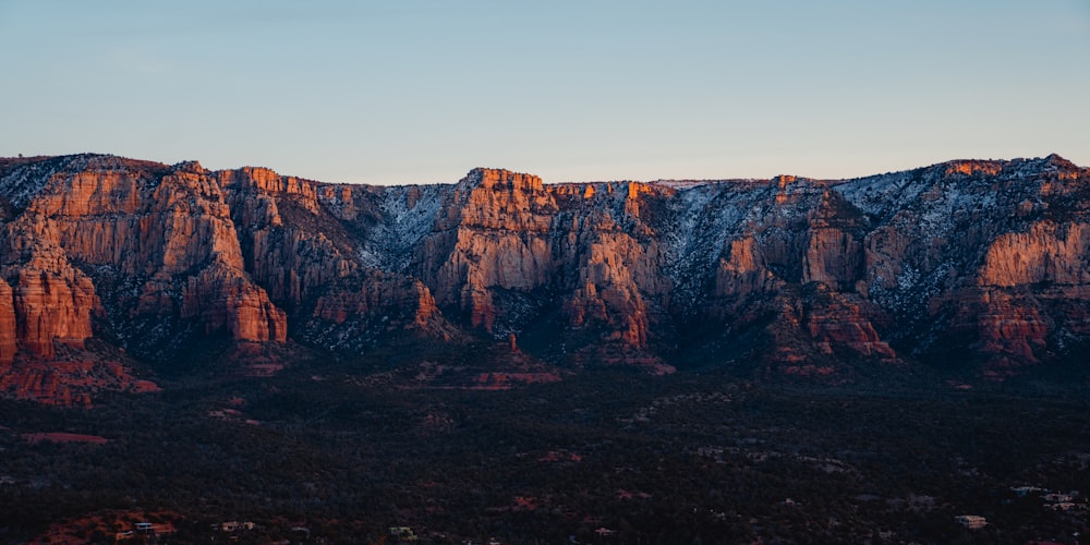 a mountain range with snow on the top of it