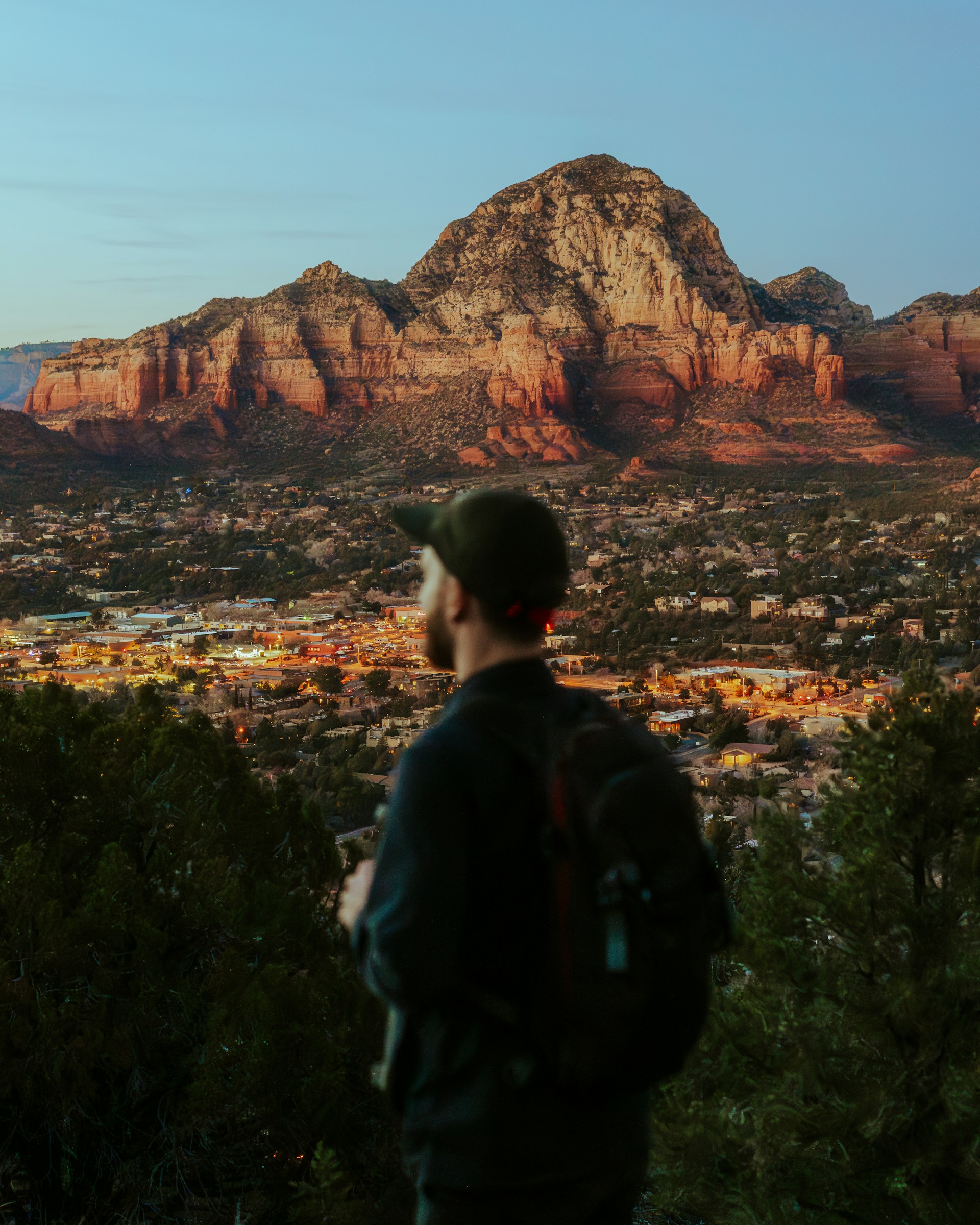 woman wearing yellow long-sleeved dress under white clouds and blue sky during daytime