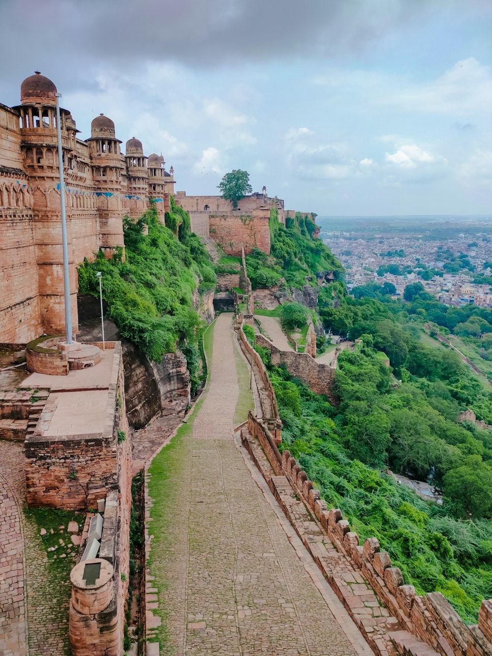 a view of a city from the top of a hill