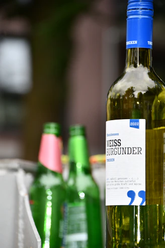 a close up of a bottle of wine on a table