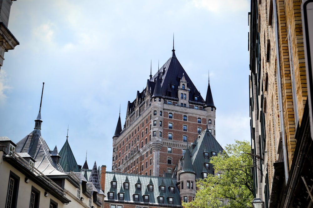 a tall building with a clock on the top of it