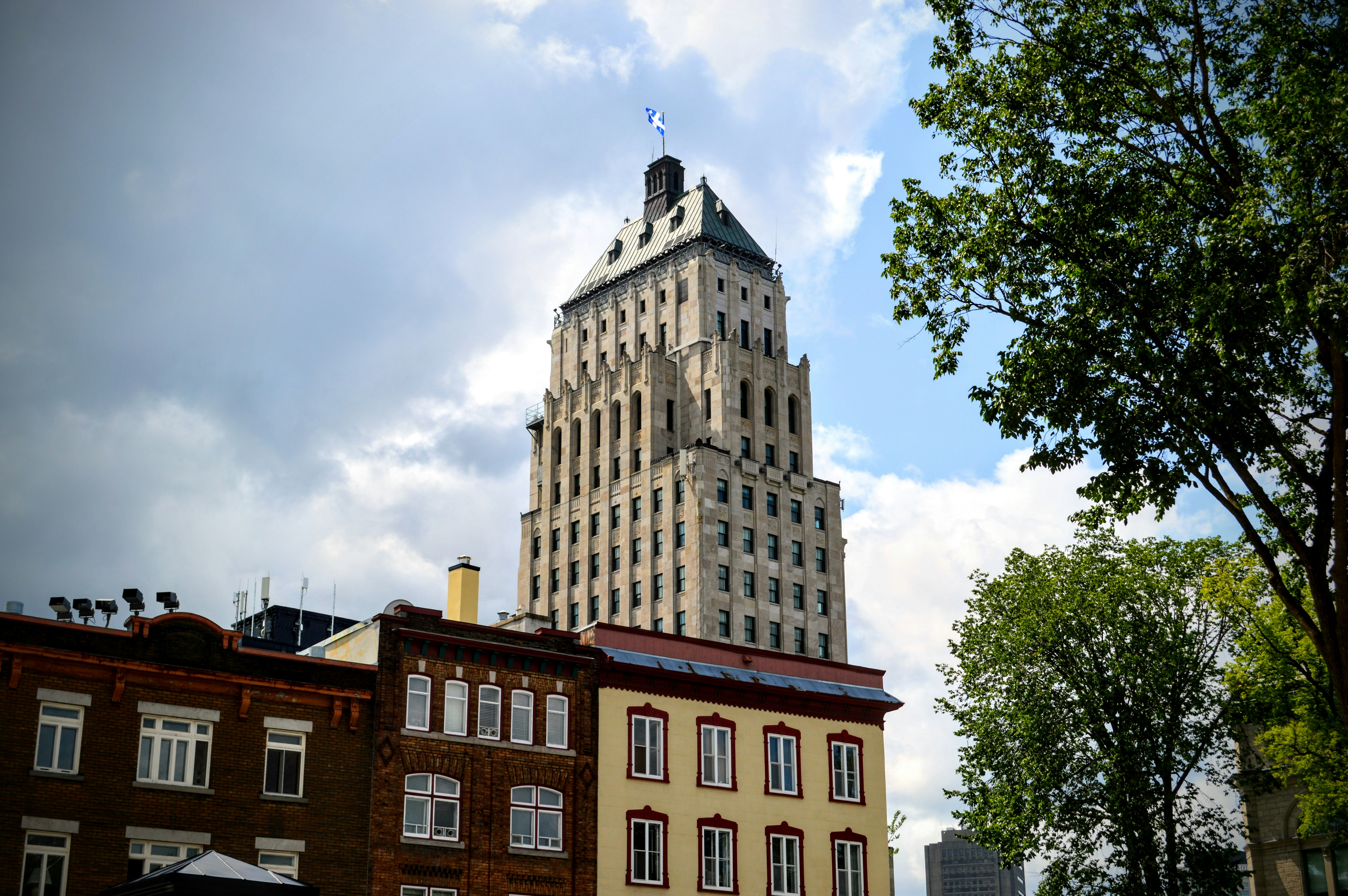 a tall building with a clock on the top of it