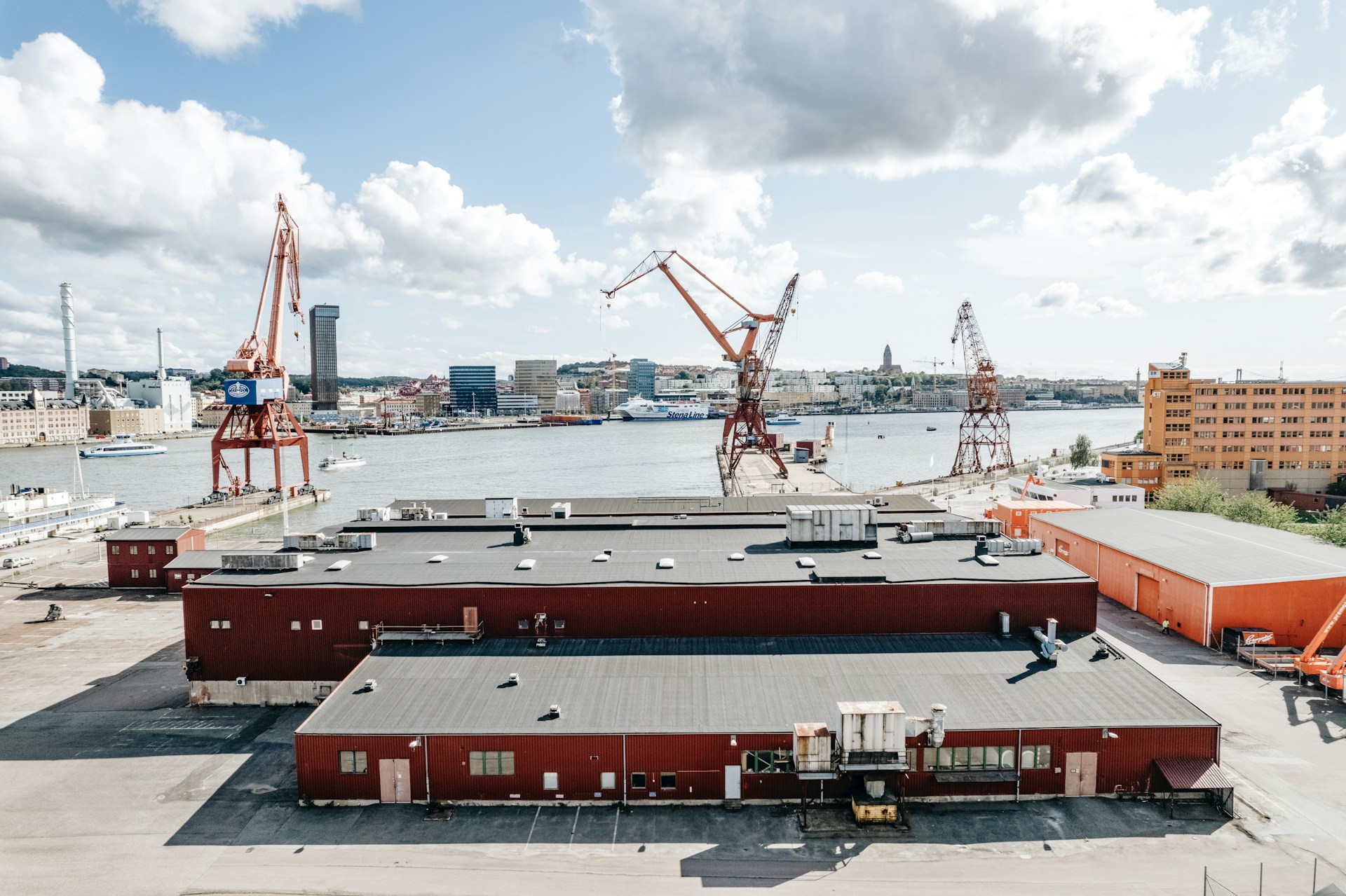 woman wearing yellow long-sleeved dress under white clouds and blue sky during daytime