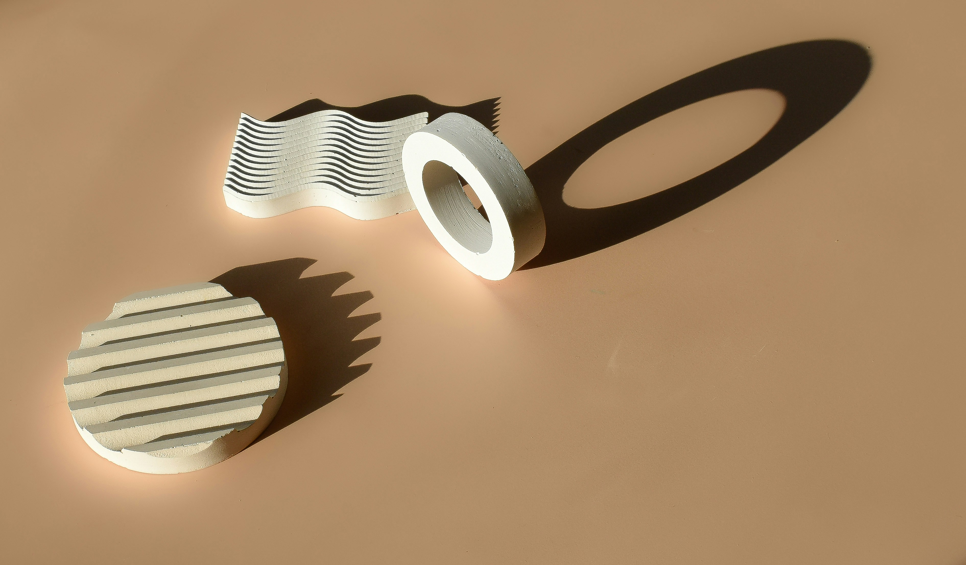 a pair of scissors and a comb on a table