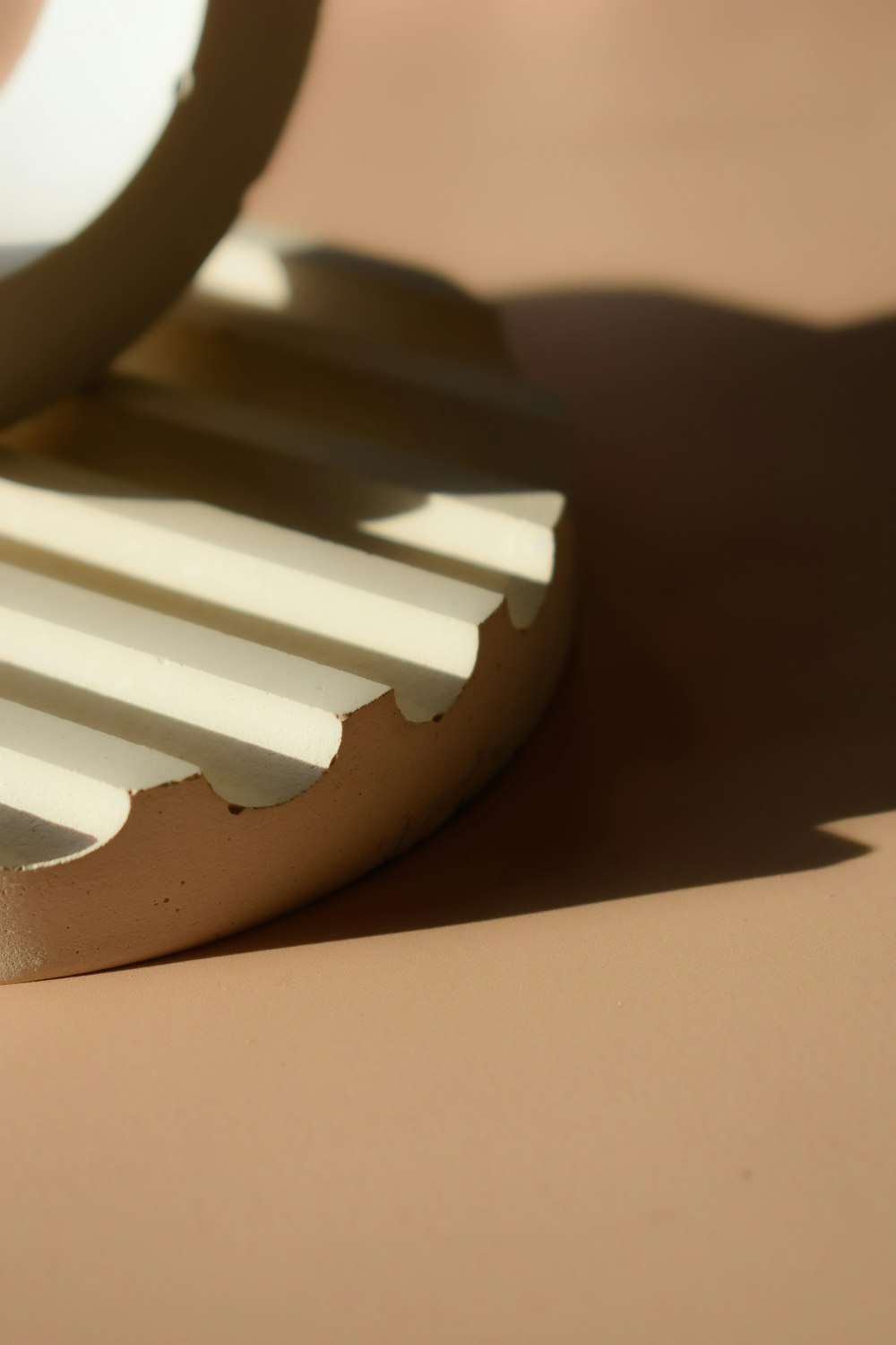 a close up of a mirror on a table