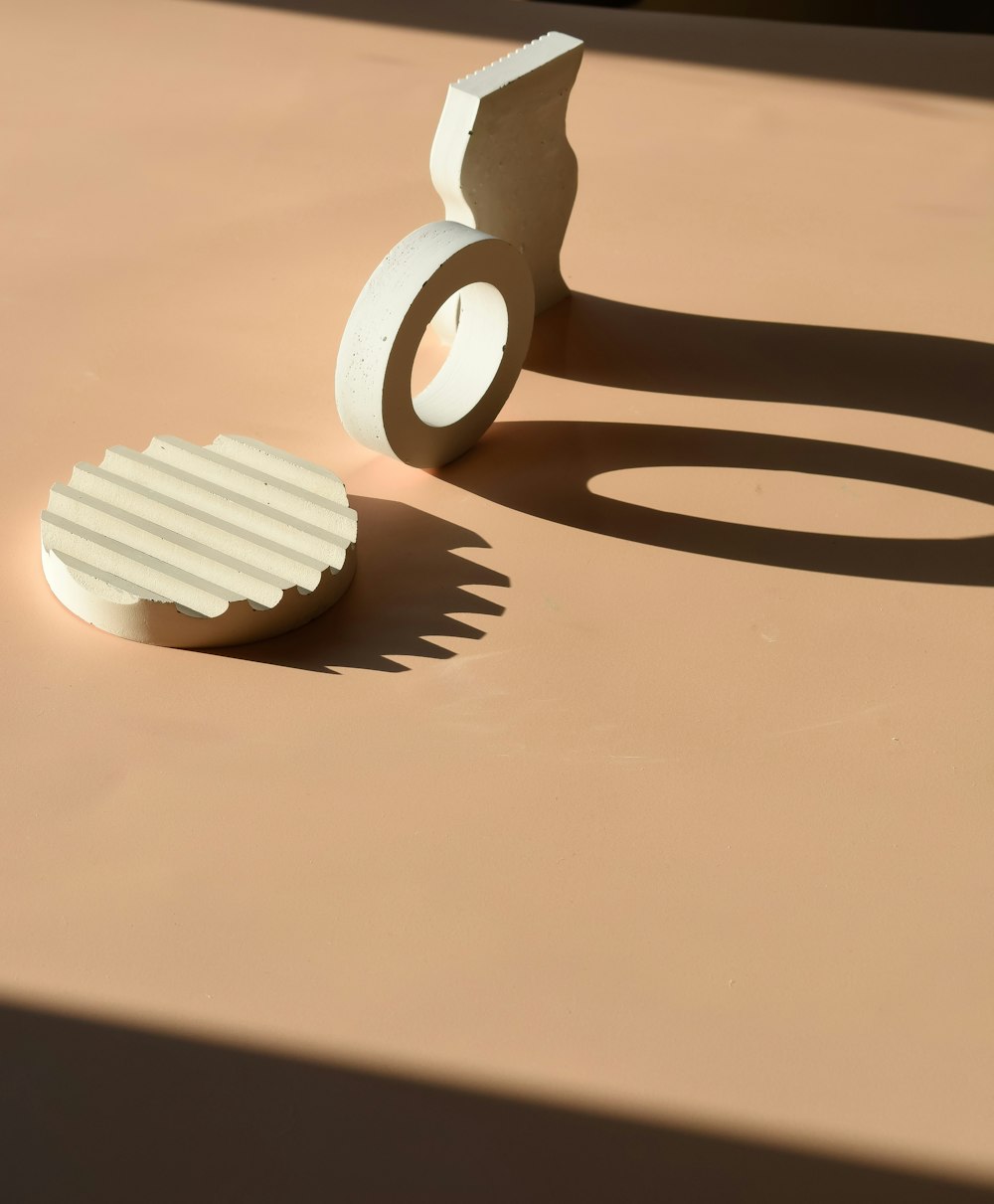 a couple of white objects sitting on top of a table