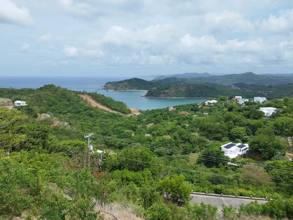 a scenic view of a small island in the middle of the ocean