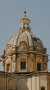 a large building with a clock on the top of it