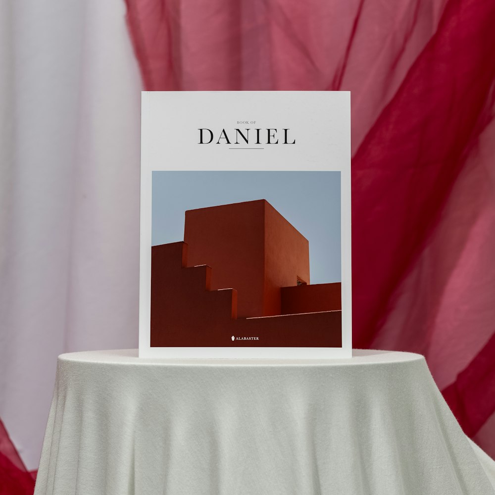 a book sitting on top of a white table