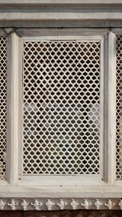 Elegant marble wall panel featuring traditional Indian motifs carved with precision.