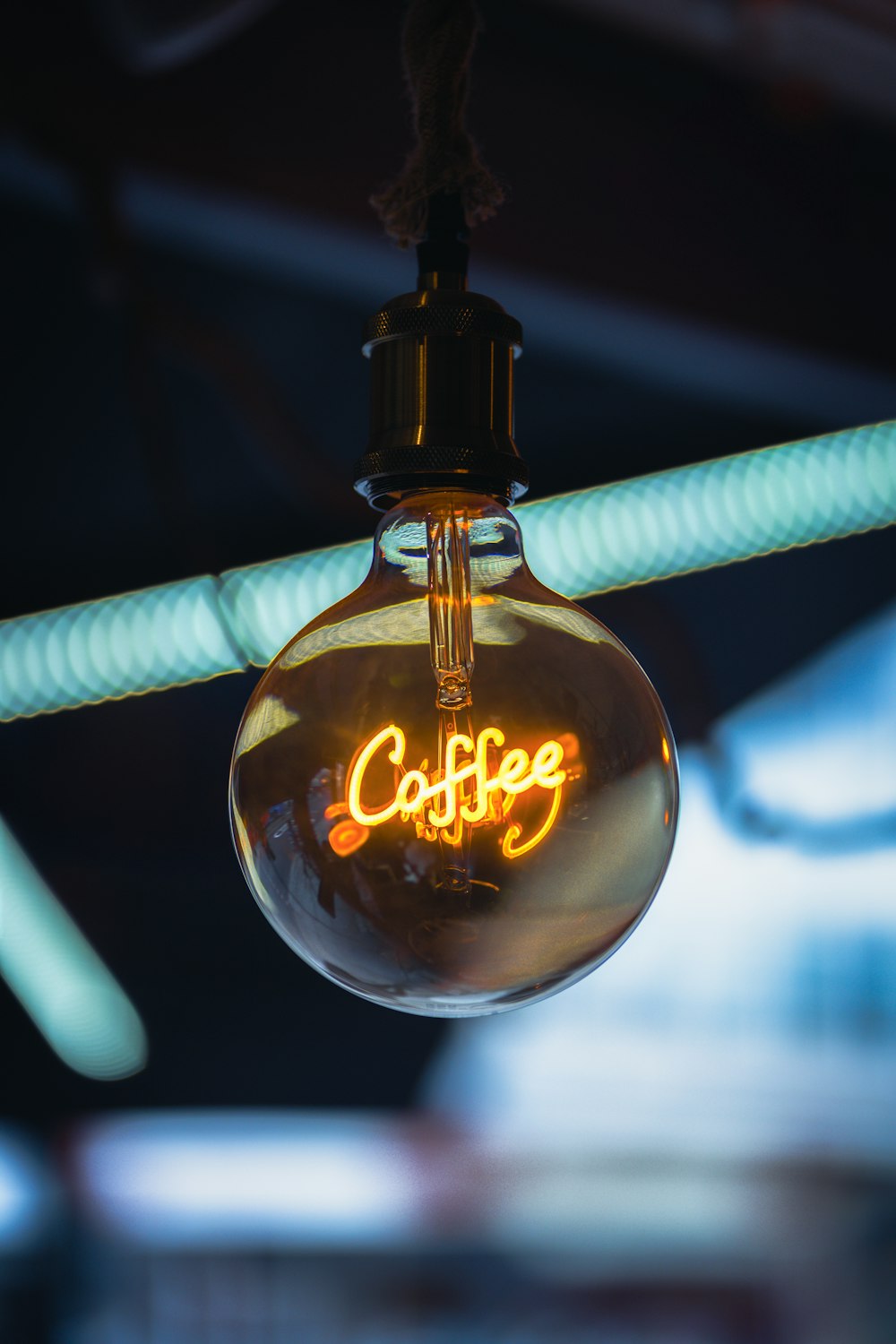 a light bulb with the word coffee written on it