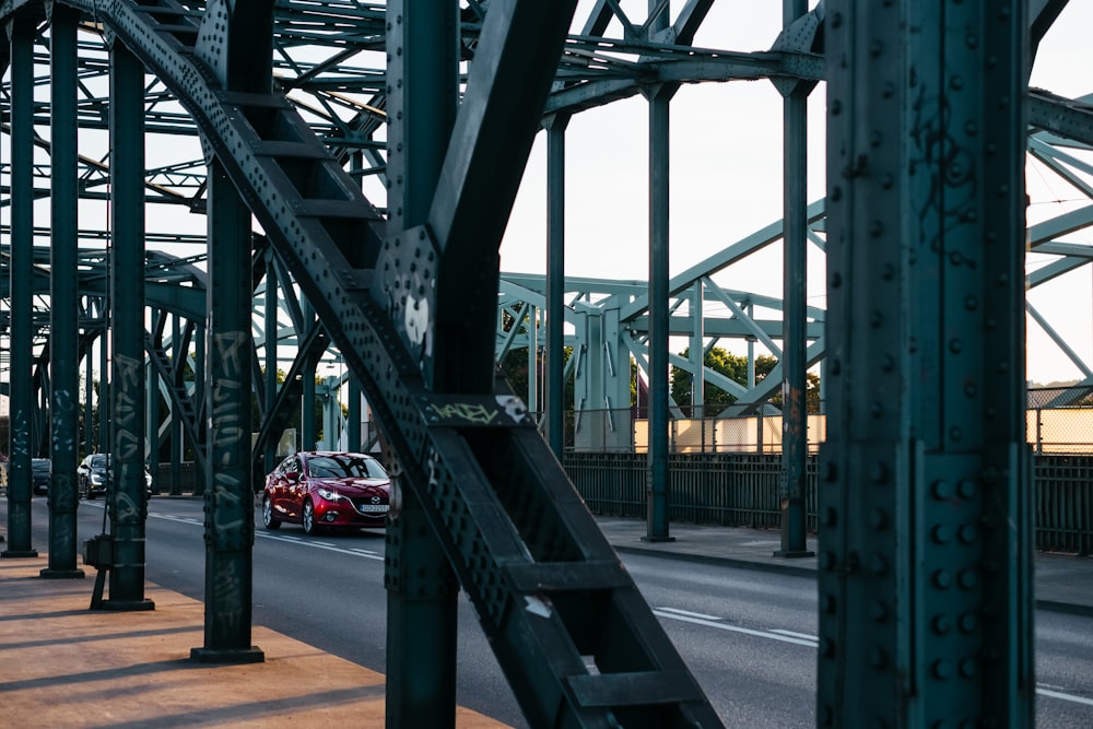 a view of a bridge with cars driving on it