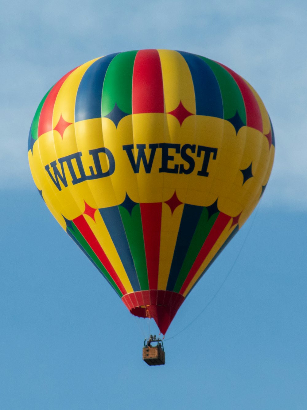 a colorful hot air balloon with the words wild west on it
