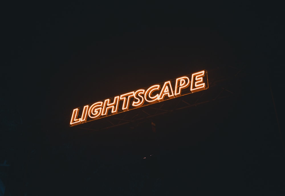a sign that reads lightscape lit up in the dark