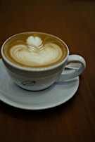 A beautifully styled coffee cup with latte art.