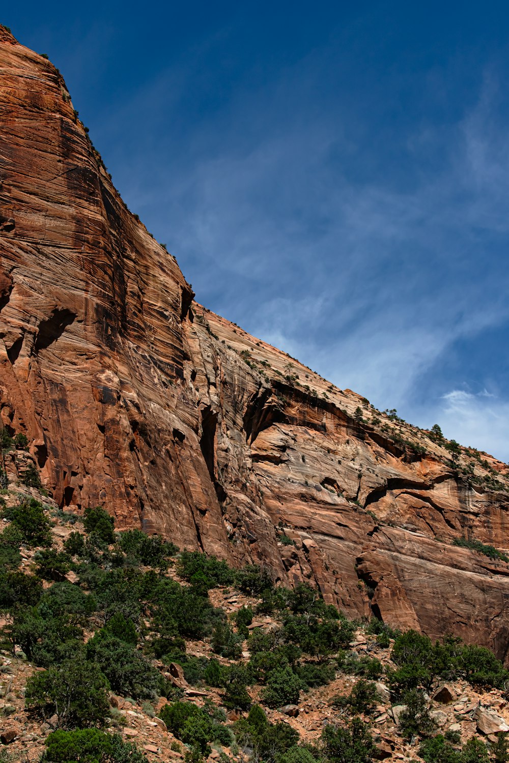 a mountain with a very tall rock face