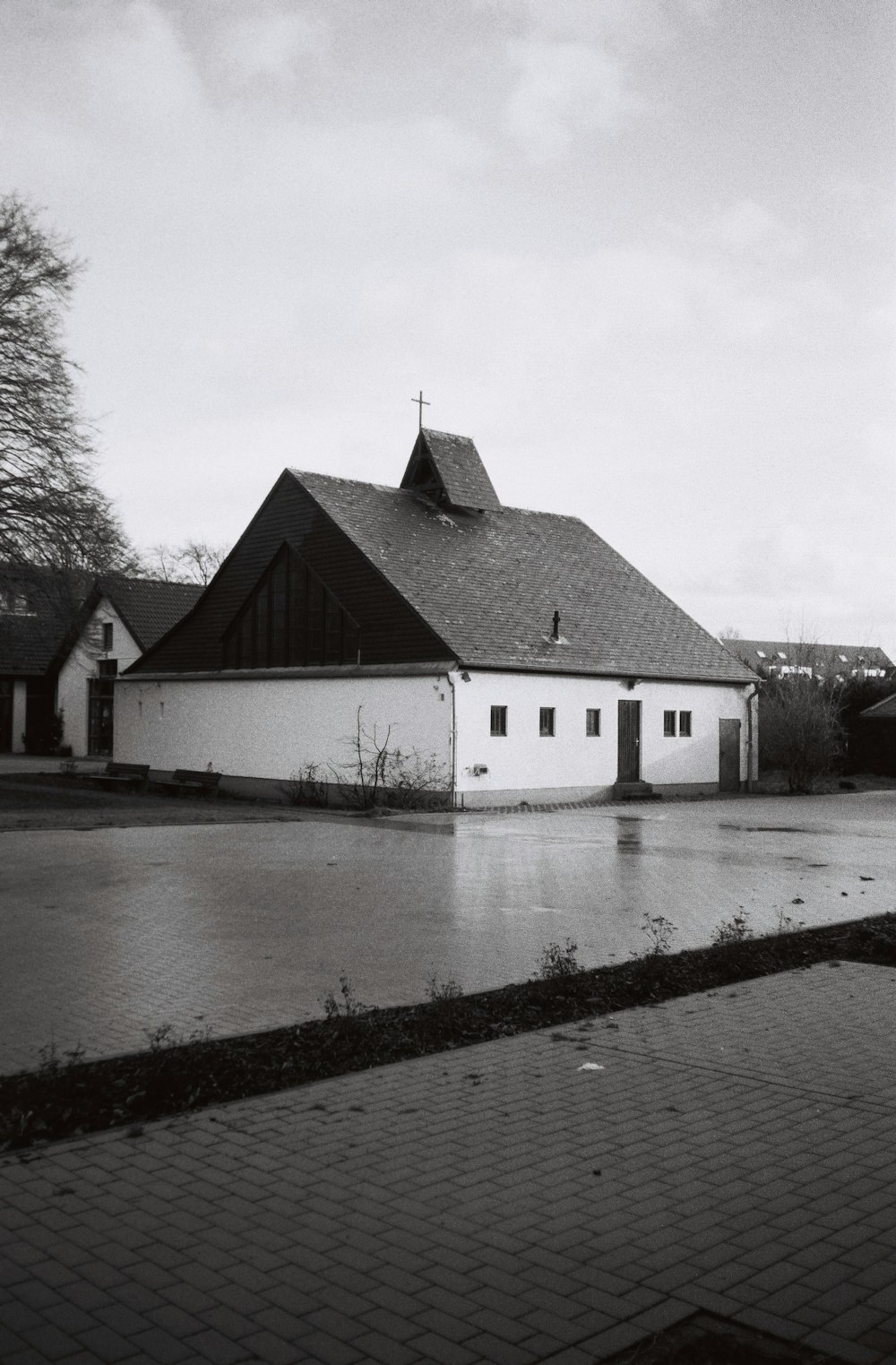 a black and white photo of a flooded street