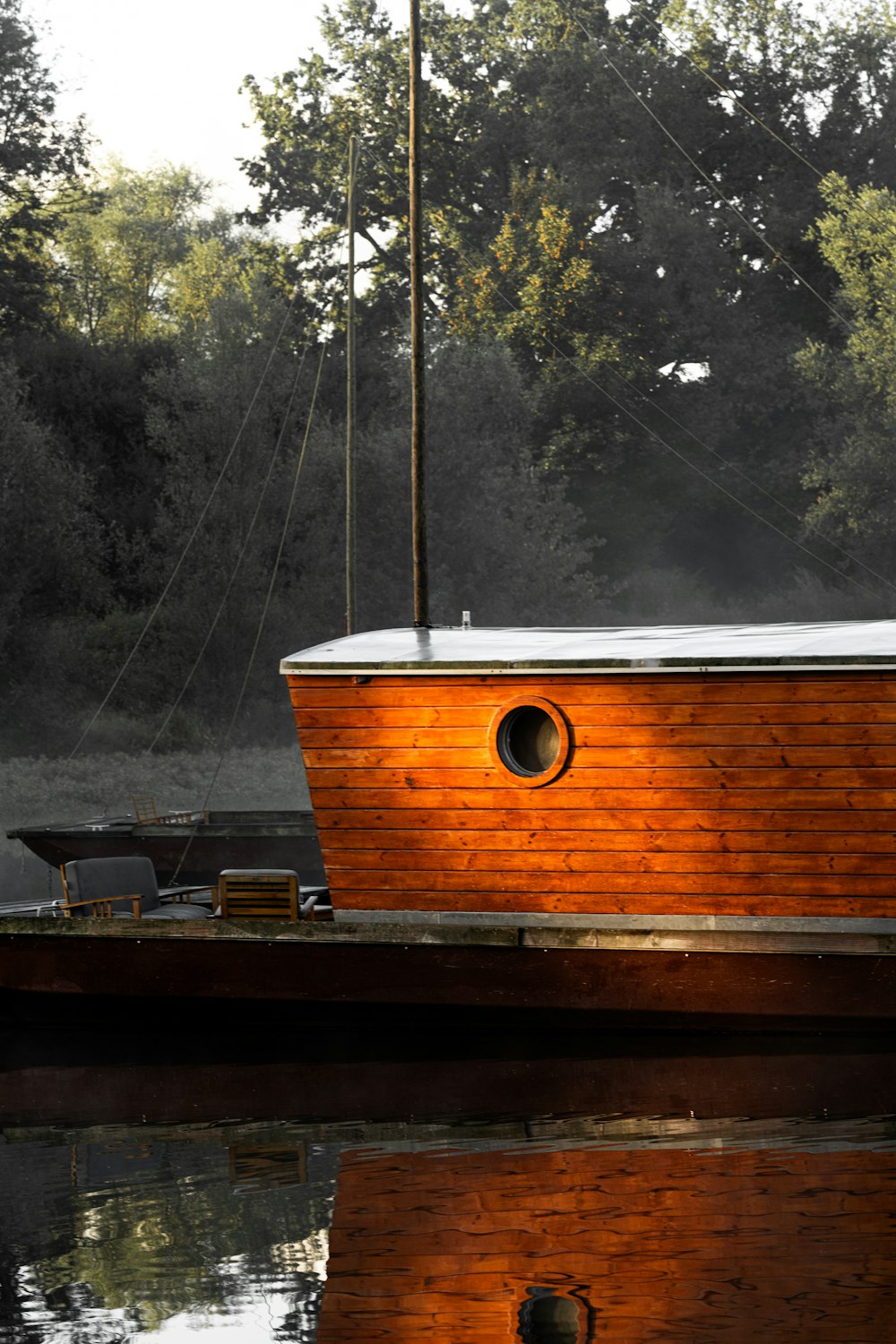 a boat sitting on top of a body of water