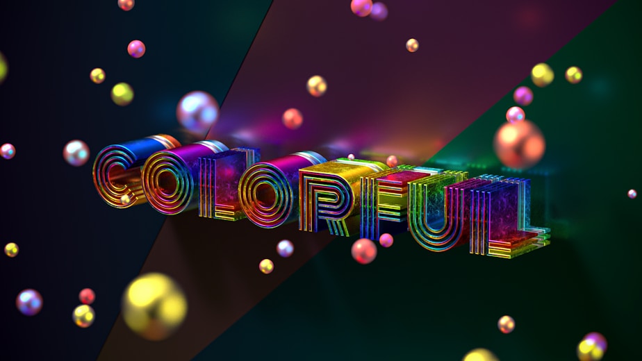 A colorful 3D text model displayed in a creative workspace.