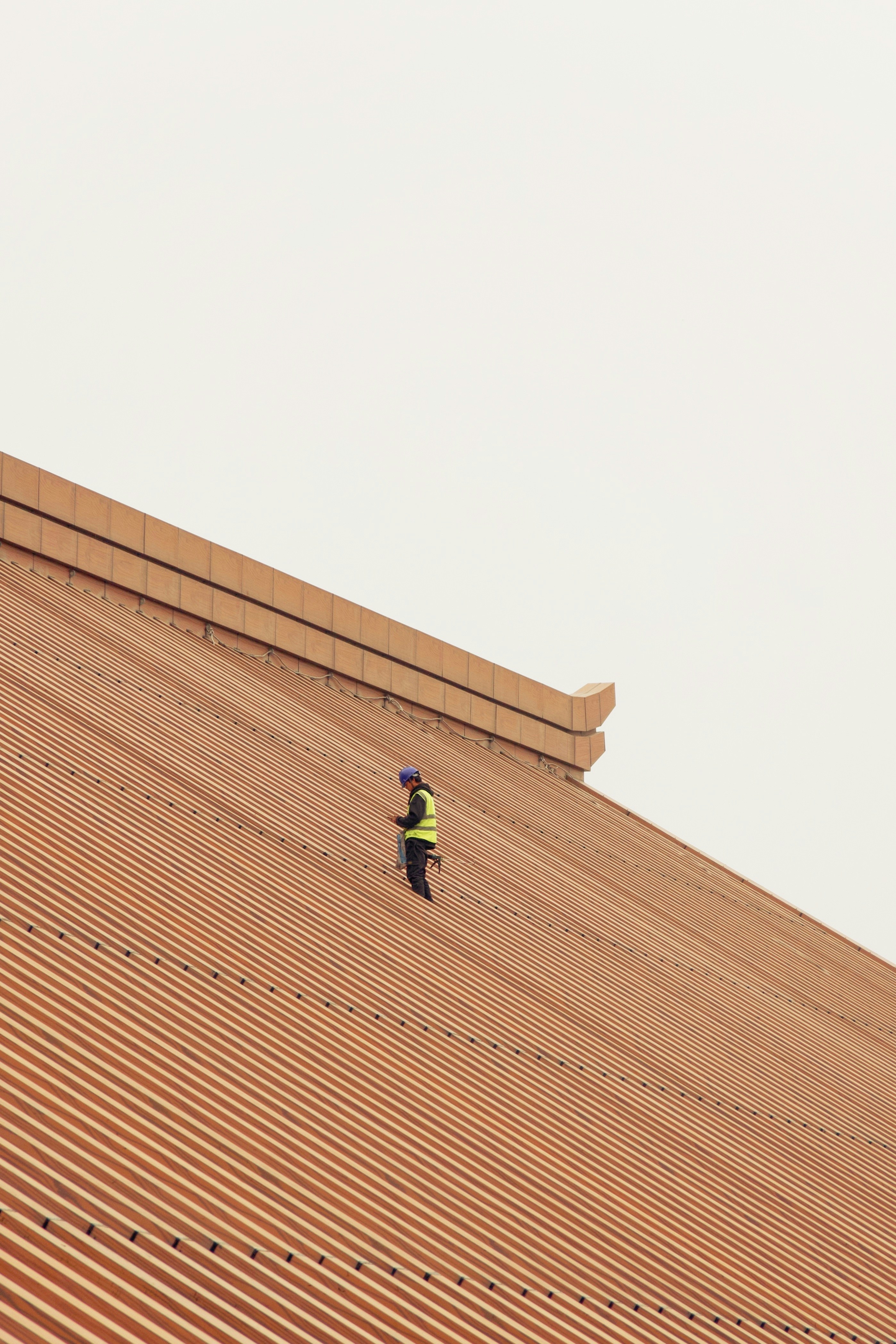 a person standing on top of a roof