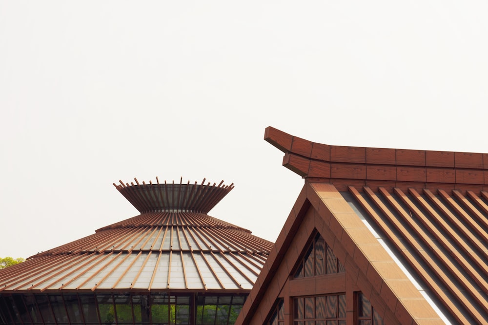 the roof of a building with a bird on top of it