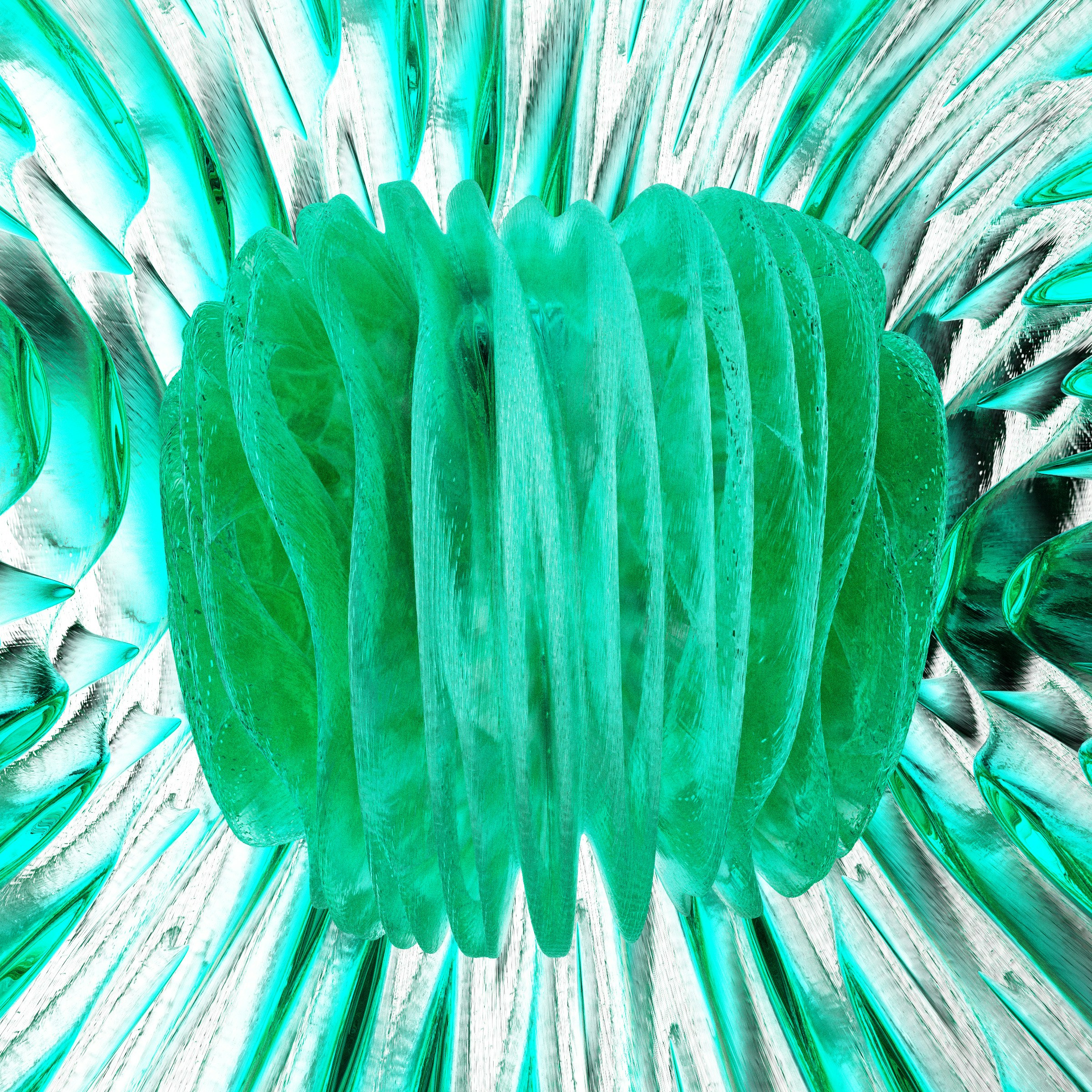 A close up of a green and silver object photo – Free Turquoise Image on ...