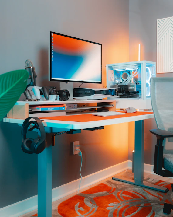 Realistic gaming desk setup with monitor, keyboard, and mouse