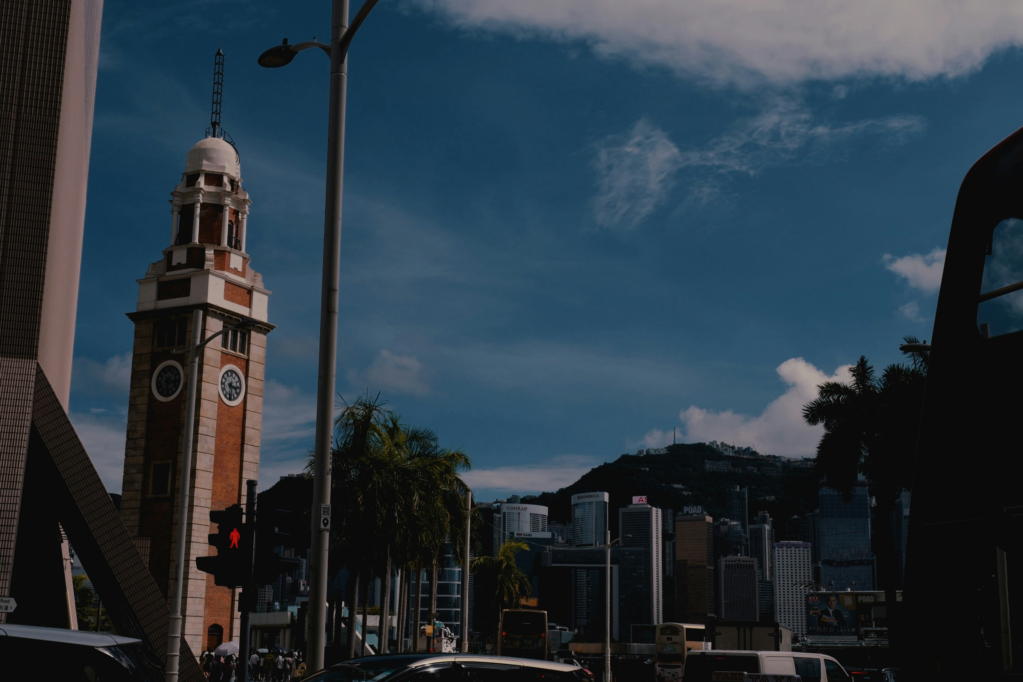A tall clock tower towering over a city photo – Free Hong kong Image on ...