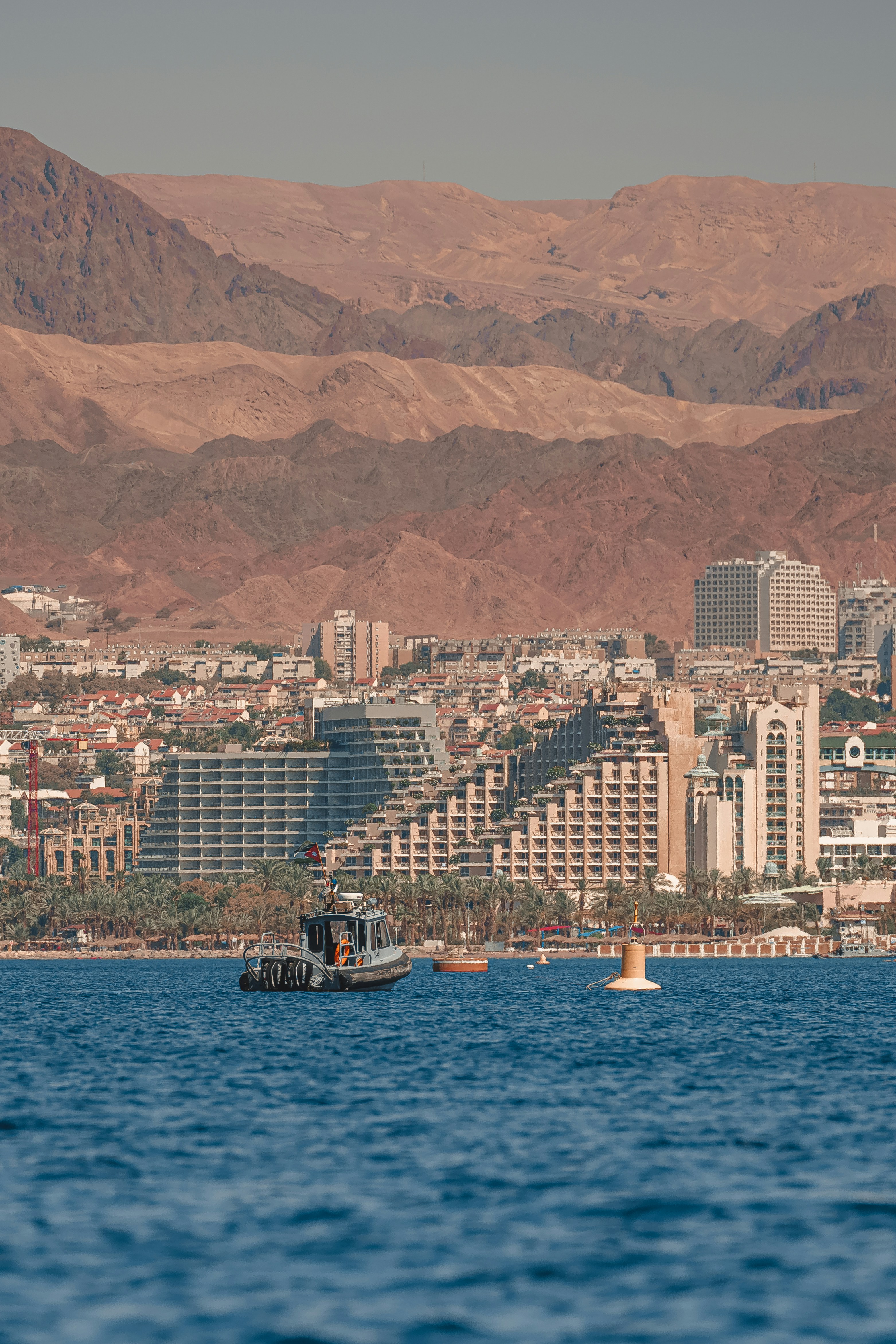 a boat in the middle of a body of water
