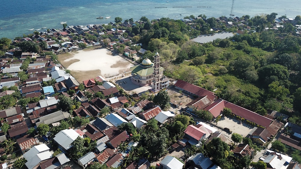 a bird's eye view of a small town by the ocean