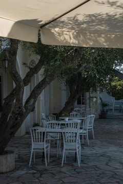 A canopy structure providing shade over an open-air event patio.
