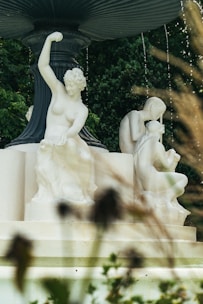 A stunning marble fountain showcasing intricate carvings and a smooth finish.